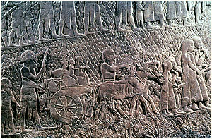 Fig. 32. The relief: A Judean family leaving the destroyed city